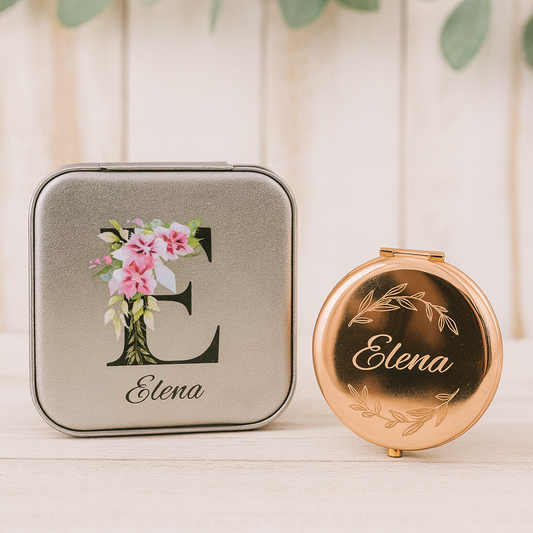 Two compact mirrors with floral and leaf designs on a neutral background