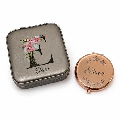 Compact mirror with floral design and 'Elena' branding on a white background