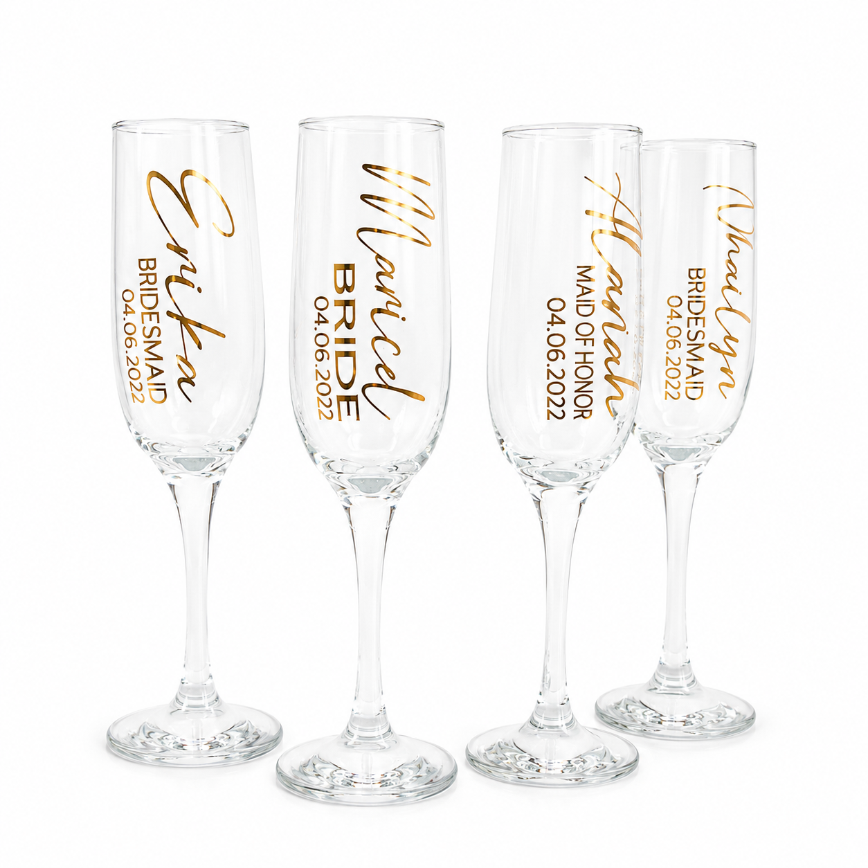Four champagne flutes with personalized text in gold on a white background