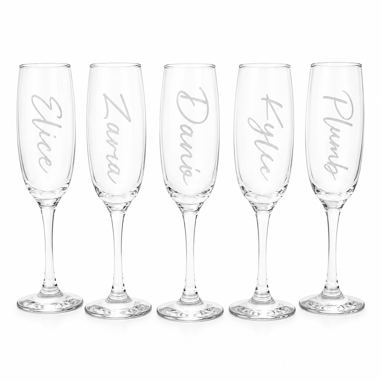 Set of five personalized champagne flutes with names engraved on a white background