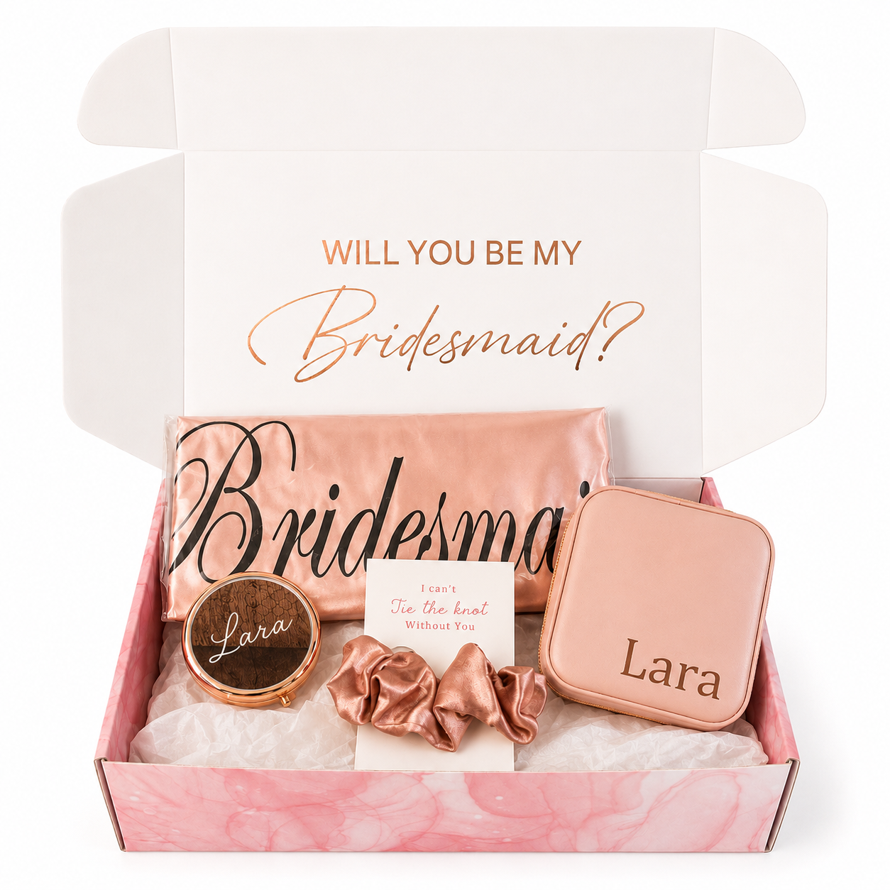 Gift set with 'Will you be my bridesmaid?' question and personalized items in a box.
