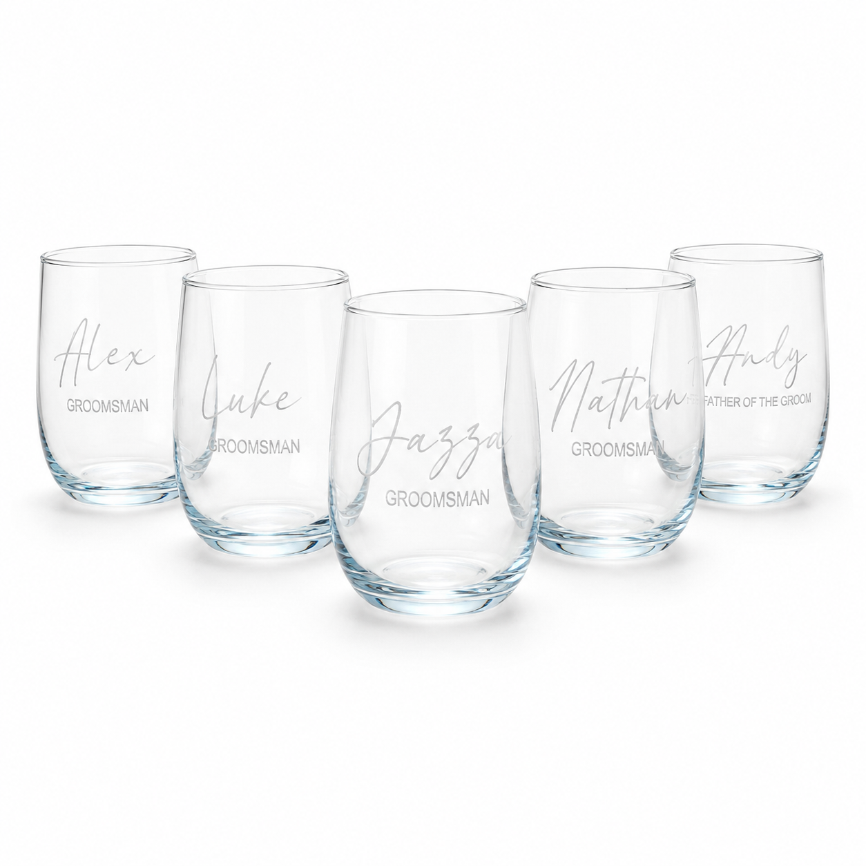 Set of five clear glasses with personalized names on a white background