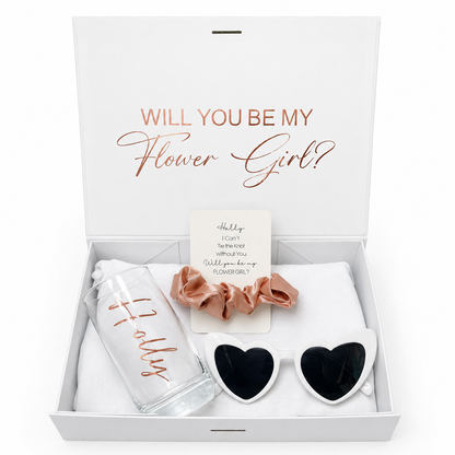 Gift set with 'Will You Be My Flower Girl?' message, sunglasses, scrunchies, and a water bottle in a box.