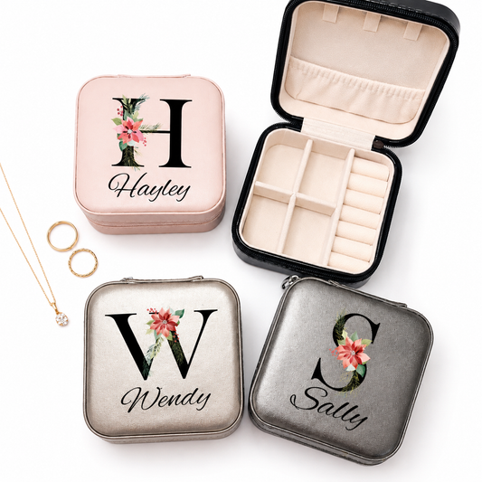 Four jewelry cases with personalized initials 'H', 'W', and 'S' on a white background.