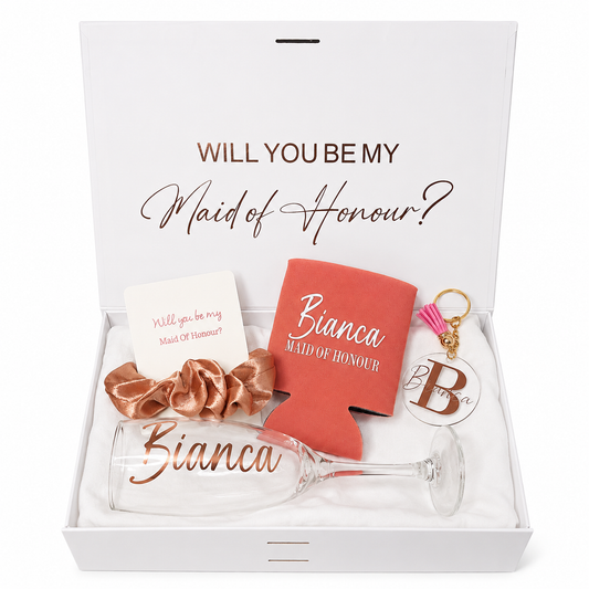 Gift set with 'Will you be my Maid of Honour?' card, bow, can cooler, and keychain in a box.