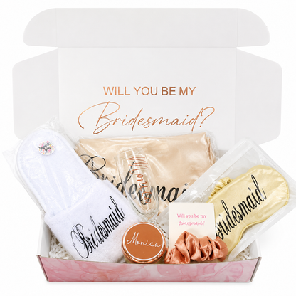 Gift set with 'Will you be my bridesmaid?' message and various items in a box.