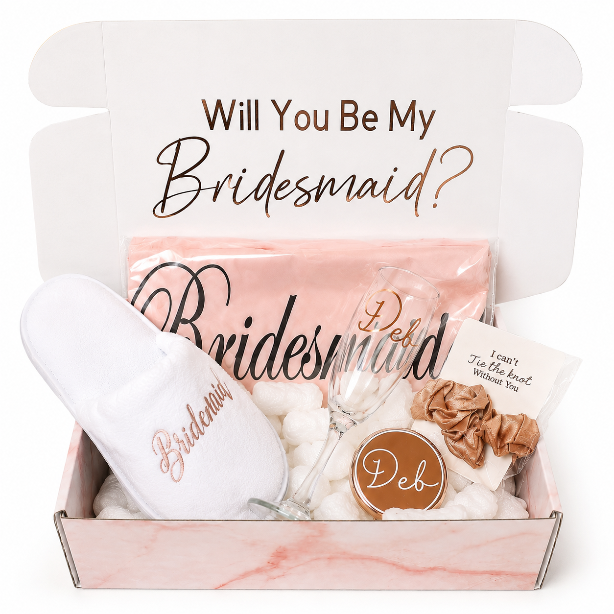Gift set with 'Will You Be My Bridesmaid?' message and bridal-themed items.