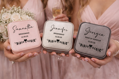 Three personalized jewelry cases held by people, each labeled with a name and date.