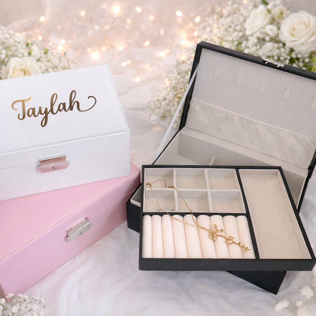 Jewelry box with jewelry inside, surrounded by flowers and a personalized box labeled 'Taylah'.