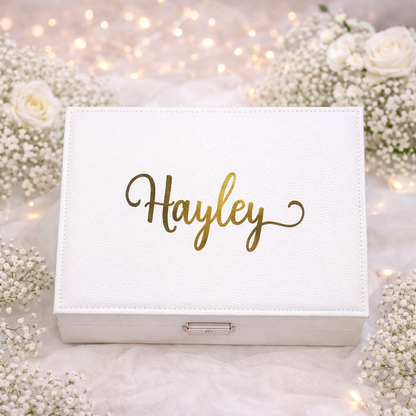 White jewelry box with 'Hayley' in gold on a floral background