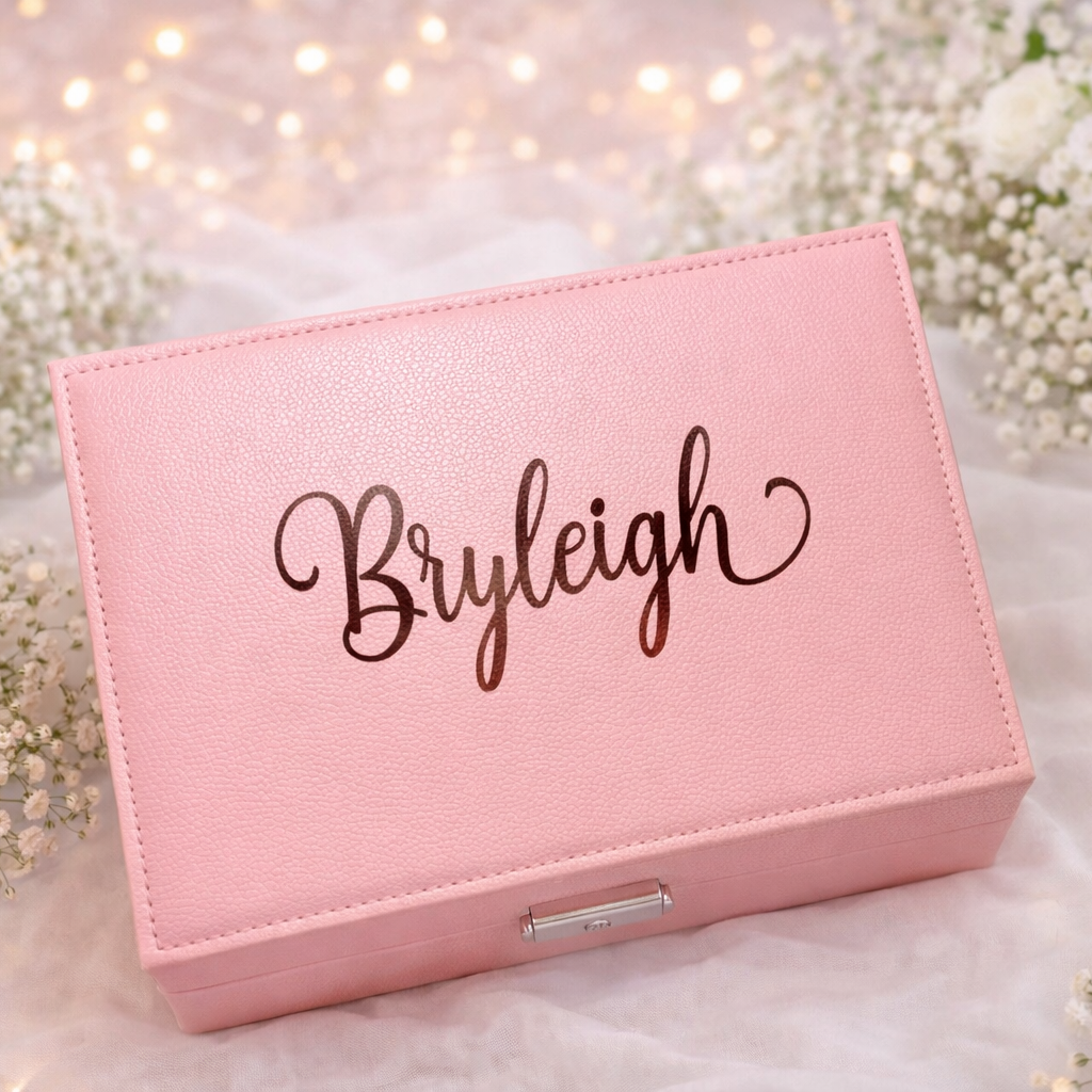 Pink jewelry box with 'Bryleigh' engraving on a floral background