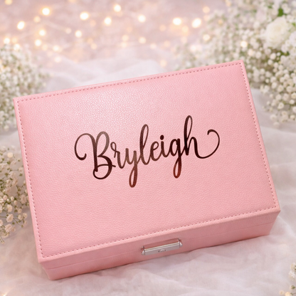 Pink jewelry box with 'Bryleigh' engraving on a floral background