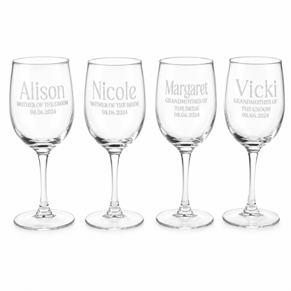 Four wine glasses with engraved names and dates on a white background