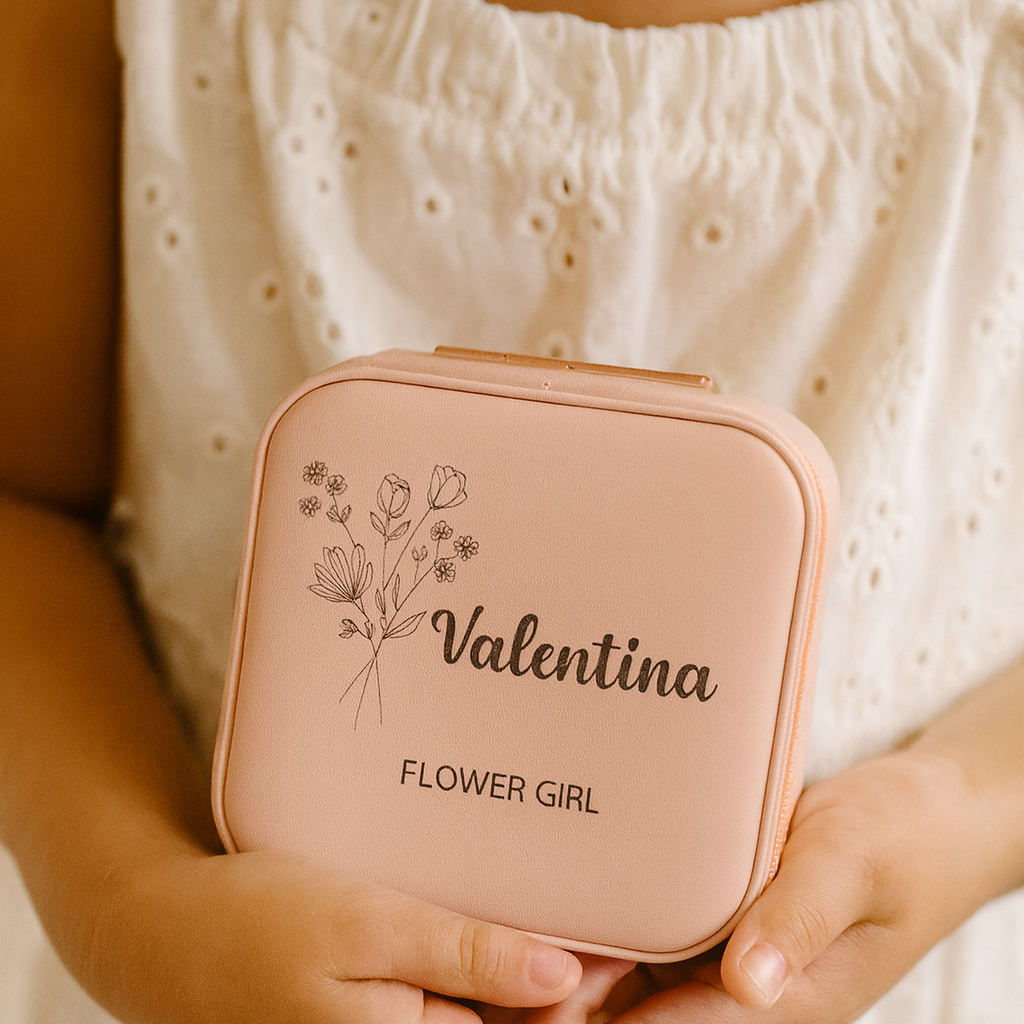 Pink case with 'Valentina Flower Girl' text and floral design held by a person.