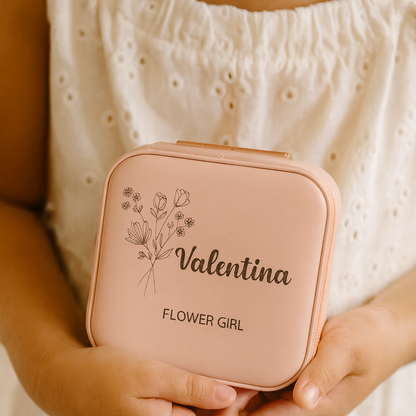 Pink case with 'Valentina Flower Girl' text and floral design held by a person.