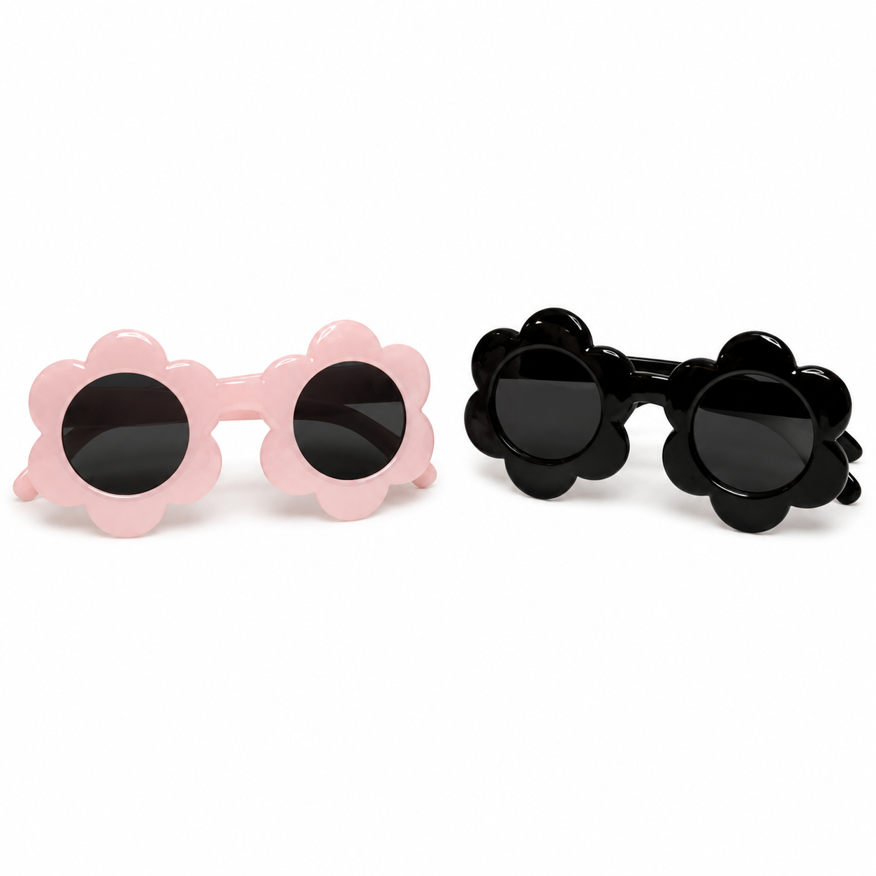 Two pairs of sunglasses with flower-shaped frames, one pink and one black, on a white background.