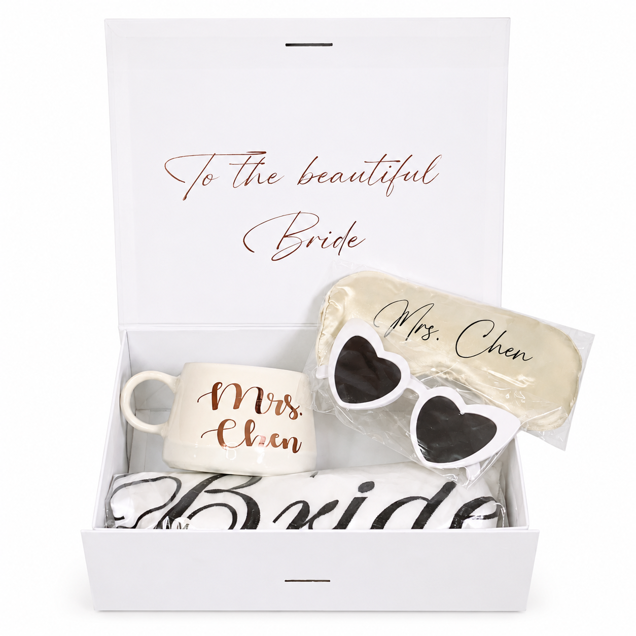 Gift set for the bride with mug, sunglasses, and pouch in a box.