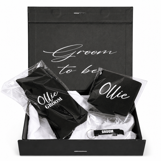 Groom to be gift set with black bow tie, white shirt, and black vest in a box.