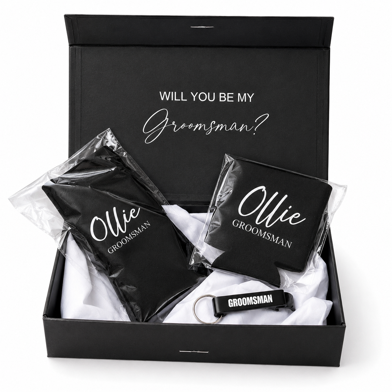 Groomsmen gift set with black pouches, coasters, and keychain in a box.