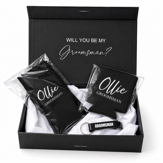 Groomsmen gift set with black pouches, coasters, and keychain in a box.