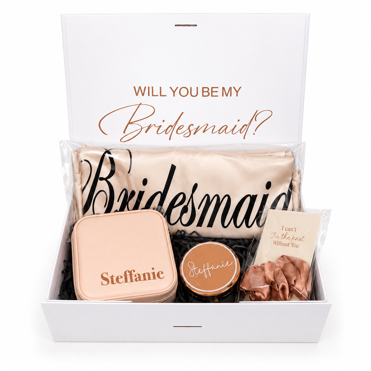 Gift set with 'Will You Be My Bridesmaid?' message and personalized items.