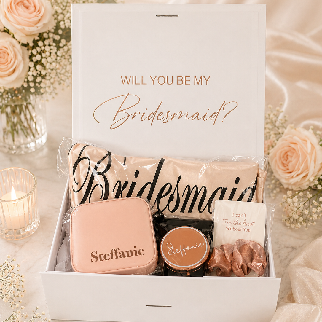 Gift box with 'Will you be my Bridesmaid?' message and personalized items on a floral background