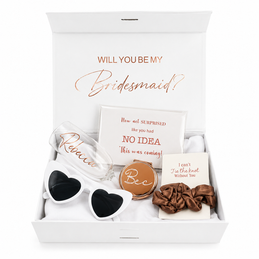 Gift set with 'Will you be my bridesmaid?' question and accessories in a box.