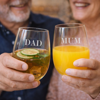 Two people holding glasses labeled 'DAD' and 'MUM' with drinks.