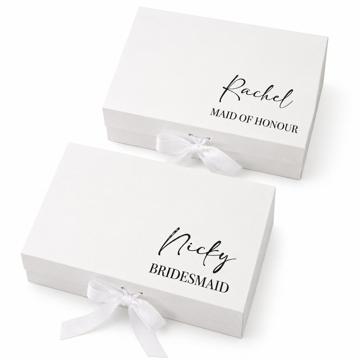 Two white gift boxes with personalized names on a white background