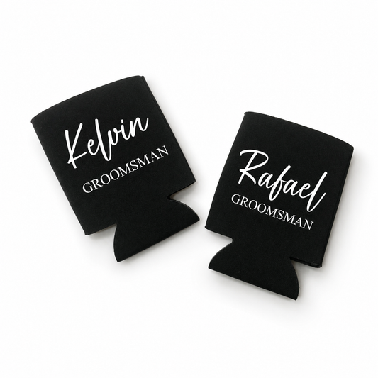 Two black can coolers with 'Kelvin GROOMSMAN' and 'Rafael GROOMSMAN' text on a white background