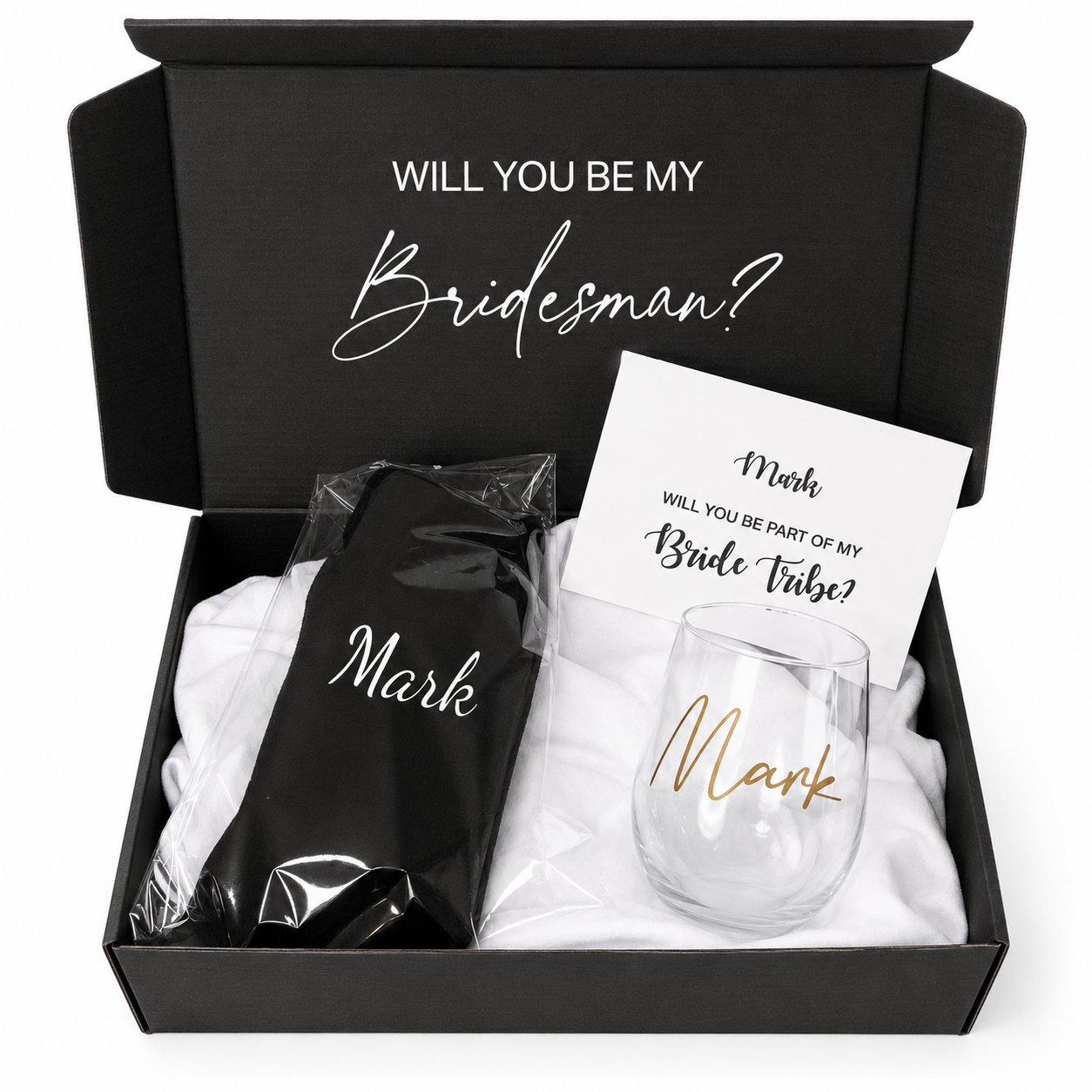 Gift set with a black shirt, white towel, and wine glass in a box with 'Will you be my Bridesman?' text.